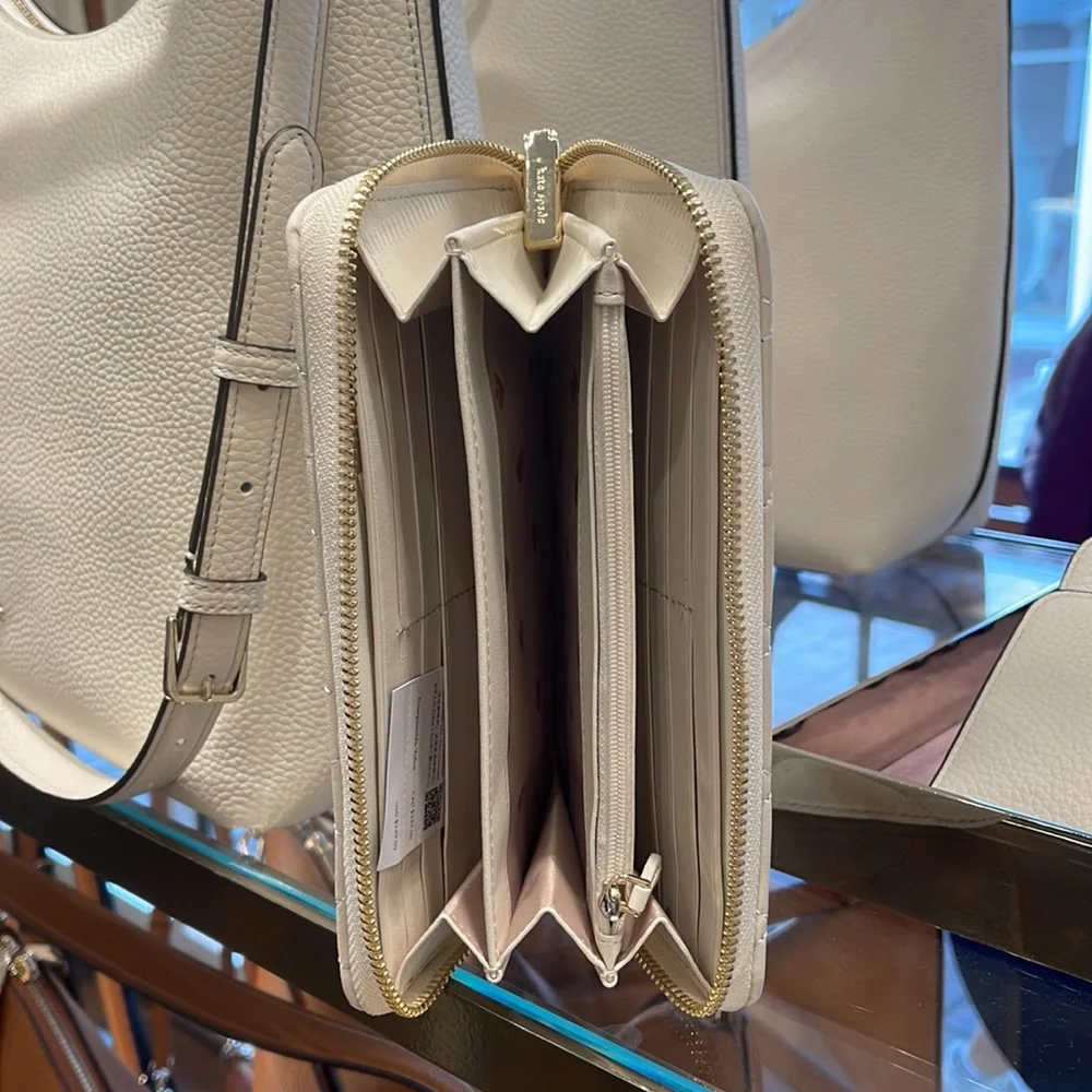 Kate Spade Carey Large Continential Wallet
Parchment - Picture 9 of 16